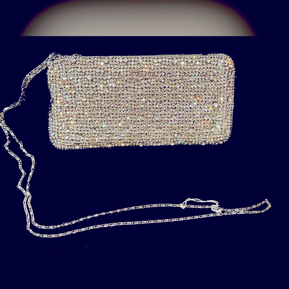 Stunning real crystal clutch with pink lining